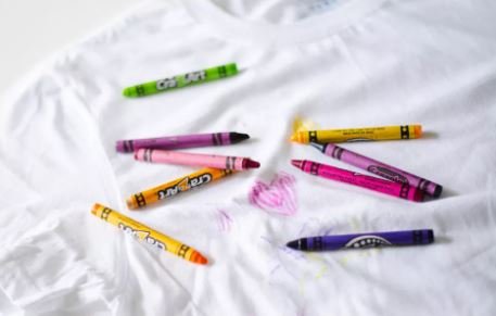 remove crayons from clothes when the stain is fresh.